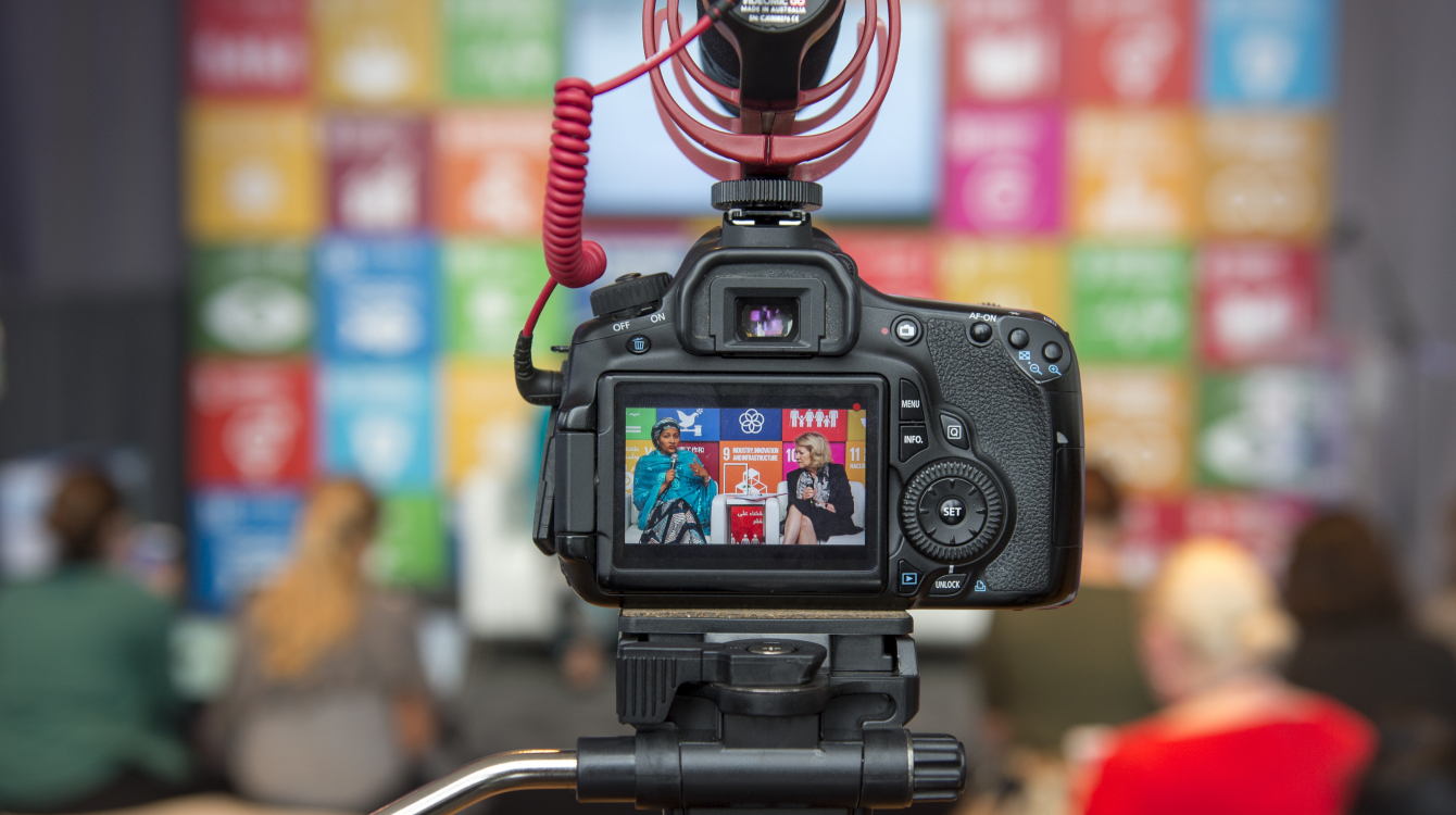 Deputy Secretary-General Amina Mohammed (left, on screen) in an interview at the SDG Media Zone.