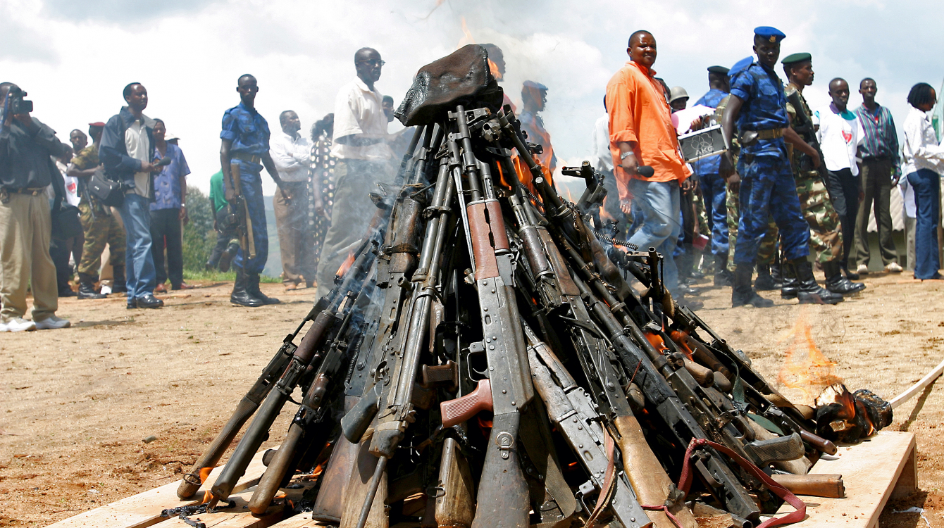 Weapons being burnt during the official launch of the Disarmament, Demobilization, Rehabilitation and Reintegration (DDRR) process in Muramvya, Burundi.             UN Photo/Martine Perret
