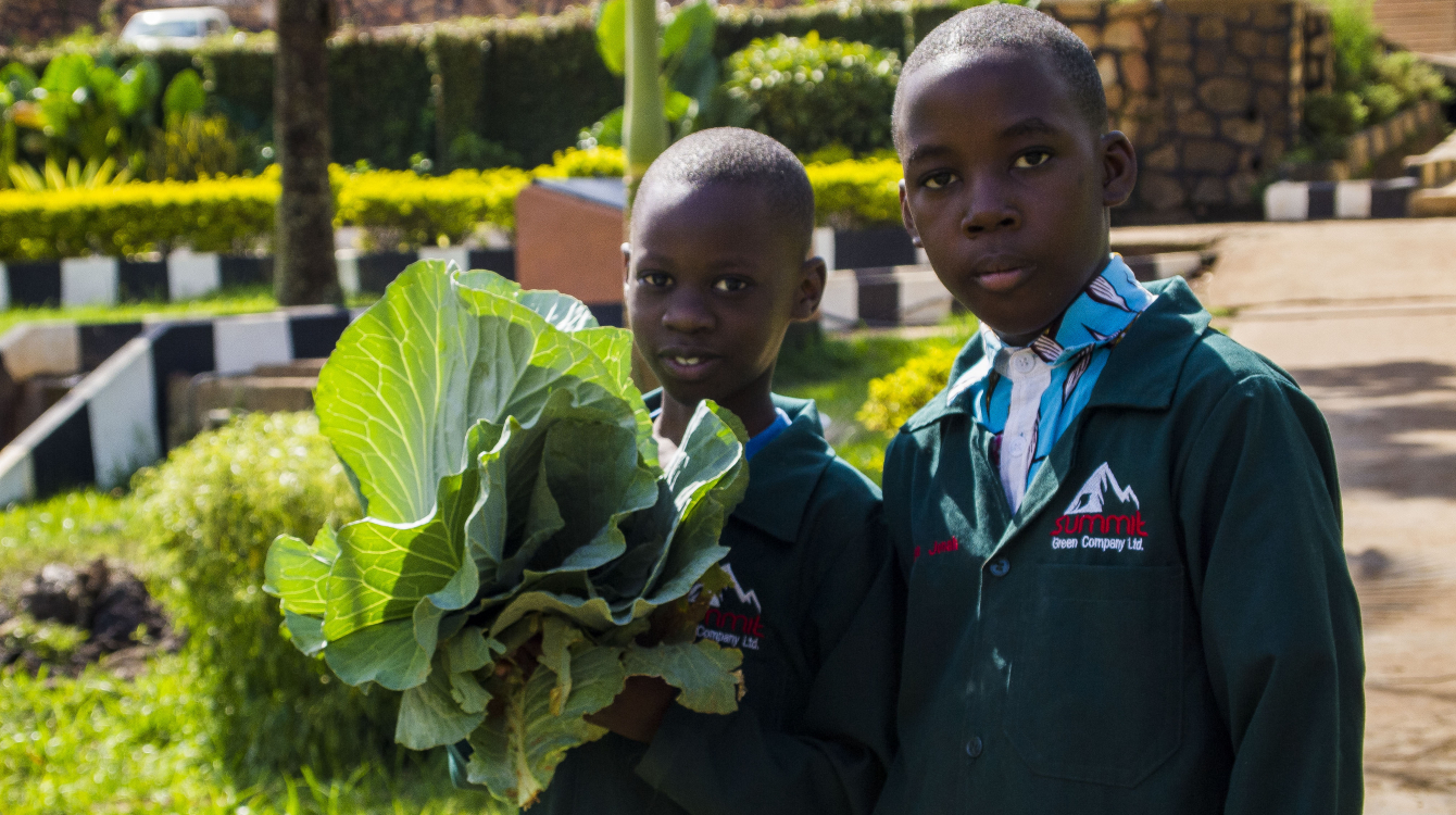 A student holding an SDG badge (top). Students holding vegetables from the school garden (left). Brian (WEYE Clean Energy) displays a  bag of briquettes (right).  Photo:  Solomon Musisi