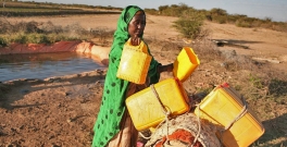 Woman gathering water in Somalia.