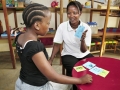 Child with autism spectrum disorder learning to improve her speech and pronunciation in an autism rehabilitation facility in Tanzania.          Panos / Dieter Telemans