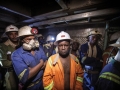 Miners in a lift cage at the Chambishi copper mine in Kitwe, Zambia. Photo: Panos/Sven Torfinn