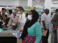 Tanzanians shopping at a supermarket in Dar-es- Salam