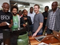 Facebook CEO Mark Zuckerberg (in grey T-shirt) meeting with entrepreneurs and developers in Nairobi, Kenya.     Facebook/Mark Zuckerberg