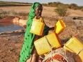 Woman gathering water in Somalia.