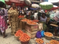 Tomato trader, Margaret Lartey, in a market in Ghana. Photo: Efam Awo Dovi