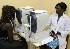 A patient undergoes an eye examination at the Owendo University Hospital in Libreville. Photo:Odilia Hebga/World Bank