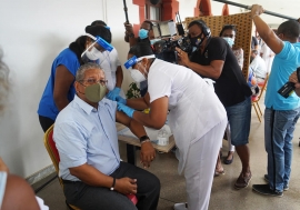 An image of An image of Wavel Ramkalawan, political leaders and health workers took the COVID-19