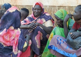 A group of seated refugees in Ethiopia.