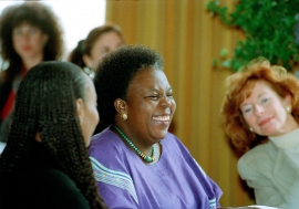 Gertrude Mongella (centre), Secretary-General of the Fourth World Conference on Women, at a media...