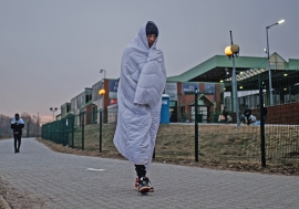 Young man from Comoros crossing border into Poland from Ukraine