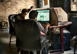 Young men using computers in a cybercafe in Cairo, Egypt, where Khaled (Jaled) Said, a 28-year-old blogger, was arrested and beaten to death by police in 2010. Later, 400,000 people joined the ‘We’re all Khaled Said’ campaign on Facebook is considered one