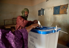 A Malian man casts his ballot at a polling station in Kidal, northern Mali.