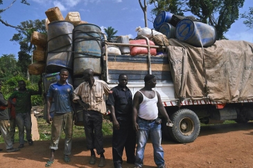 Truckers from Guinea wait to be screened for Ebola at the busy Konadu checkpoint in Lofa County, Liberia.