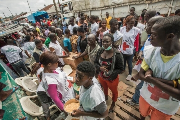 A WFP distribution centre in the heavily-populated West Point neighbourhood of Monrovia in Liberia, which was quarantined in response to the Ebola outbreak. Photo: WFP/Rein Skullerud