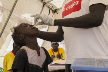 A young girl receiving oral cholera vaccination. Juba, South Sudan.