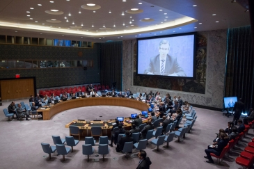 Special Representative and Head of the UN Support Mission in Libya (UNSMIL), Bernardino Léon (shown on screen), briefs the Security Council.