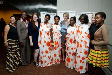 Film Director Michele Mitchell (5th right) at the UN screening of "The Uncondemned" with the four women who testified before the International Criminal Tribunal for  Rwanda and Godeliève Mukasarasi of the SEVOTA support group for widows and orphans. UN Ph
