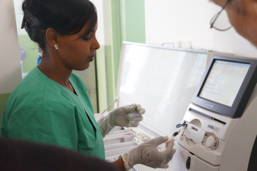 A nurse receives training on equipment donated by UNDP Eritrea