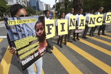 South African youths protest outside the  Cape Town Convention Centre against inequalities.    Photo: AMO/ Esa Alexander