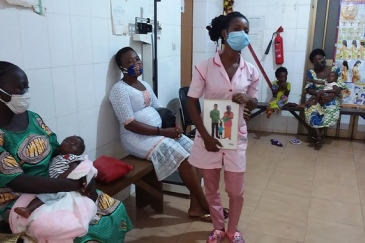 A midwife speaks about family planning at a family planning "open house" at a health centre in Assahoun, Togo.