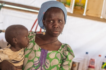 A mother and her baby at Internally Displaced People (IDP) Camp B in Mafa, Borno State, Nigeria.