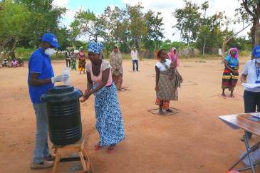 Shelter distribution for displaced families in Cabo Delgado, Mozambique incorporates social distancing, hand washing and other COVID-19 precautions.