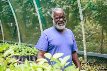 Victorin Laboudallon provides a tour of his tree nursery.