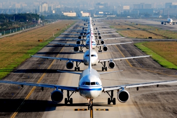 Airplanes waiting for take off.  