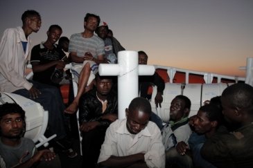 The Italian Coast Guard rescues migrants bound for Italy. Photo: IOM / Francesco Malavolta