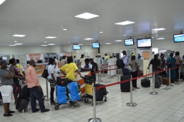 Passengers in the departure hall of Kotoka International Airport, Accra, Ghana. Photo: Ghana Airports Company