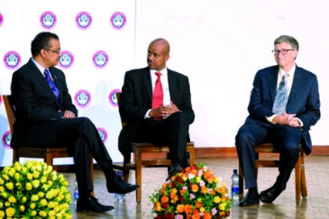 Haddis Tadesse, middle, with Ethiopian Minister of Foreign Affairs, Tedros Adhanom, left, and  Bill Gates.