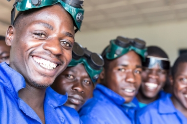 Participants at an International Organization for Migration (IOM) training on welding, mechanics, masonry and tailoring skills in Rwanda. According to a UN report, remittances accounted for 13 per cent of the country's GDP in 2012 figures.