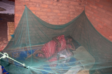 Seliya Lawrence and her 10-month-old baby, who has since received three doses of the malaria ...