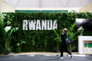 A participant walks past the Rwanda pavillon at the Sharm El Sheikh International Convention Centre
