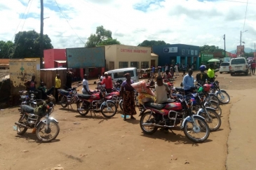 Motorcycle taxis at Lunzu town in Malawi. A good number of them are owned by women. 