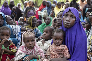 Internally displaced mothers with their children attend a WFP famine assessment exercise in Borno