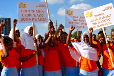 In Dar es Salaam, Tanzania, school girls organize a march against gender violence.