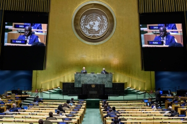 Philip Ochen Odida (on screen), Deputy Permanent Representative of Uganda, addresses the general ...