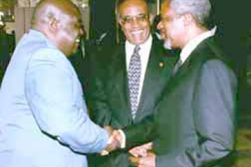 Focus on human rights: Mr. Annan with President Kabila (far left) and OAU Secretary-General Salim Salim