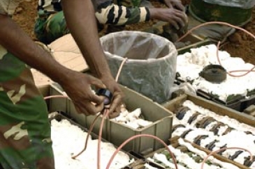 A demining company prepares to destroy anti-personnel landmines