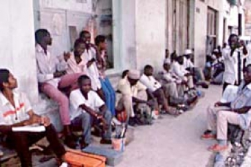 Unemployed line up for jobs in Tanzania: Not many PRSPs explicitly address job creation.   Photo: ©UN / Betty Press