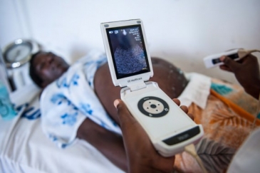 At the dispensary, Zaina can get an ultrasound examination, thanks to GE Healthcare's mobile Vscan ultrasound device. Photo credit:GE Sustainability