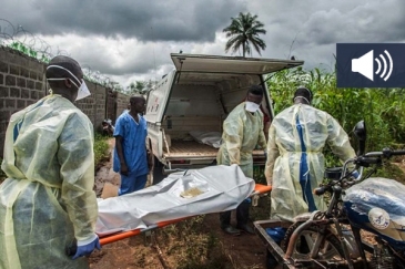 Ebola burial teams in Sierra Leone are still performing hundreds of precautionary burials each week, even though there haven't been any cases in a few weeks. Photo: Aurelie Marrier d'Unienville/IRIN