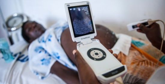 At the dispensary, Zaina can get an ultrasound examination, thanks to GE Healthcare's mobile Vscan ultrasound device. Photo credit:GE Sustainability