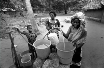 Villagers work together to build and maintain their water system