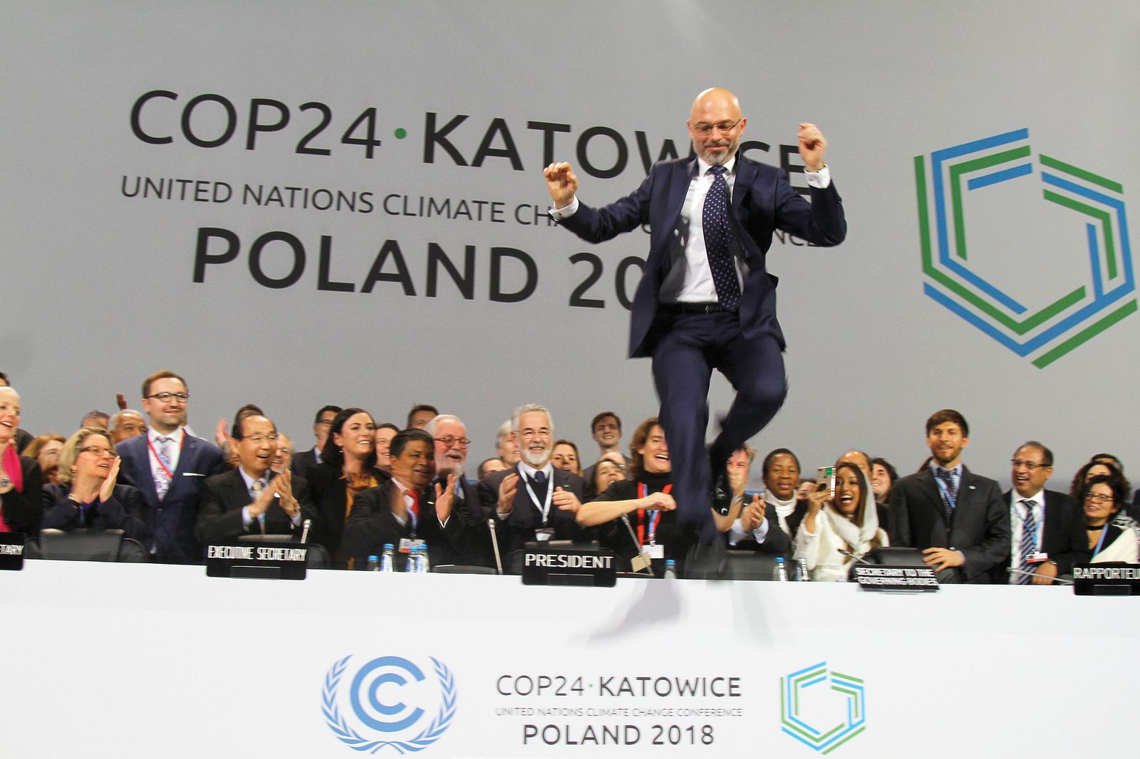 COP24 President Michael Kurtyka, State Secretary, Ministry of Energy, Poland, jumps after approval of the Paris Agreement Work Programme at 2018 Katowice conference.