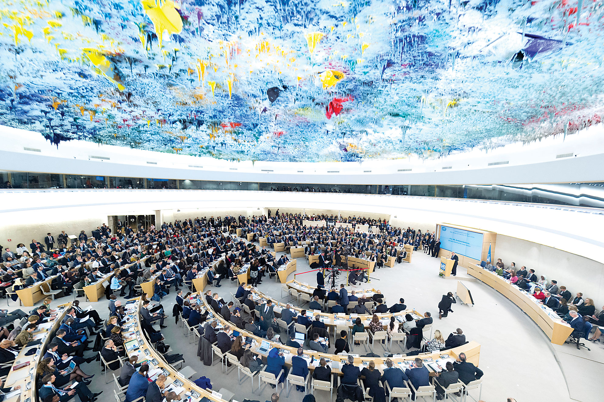 Secretary-General António Guterres (at podium) in the Human Rights Council, Geneva.