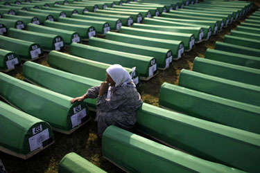 A Bosnian Muslim woman mourns at the Srebrenica-Potocari Memorial
and Cemetery for the Victims of the 1995 Genocide