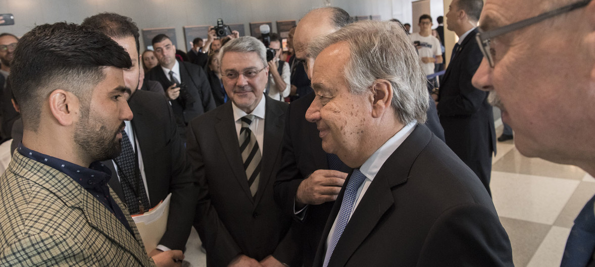 SG António Guterres speaks to victim Sayad M. Hussaini